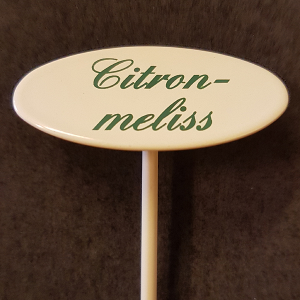 Citronmeliss skylt liten på spjut